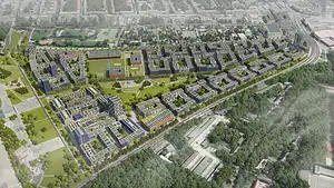 Luftbild-Visualisierung des geplanten Schumacher-Quartiers mit begrünten Wohnblocks und Sportflächen