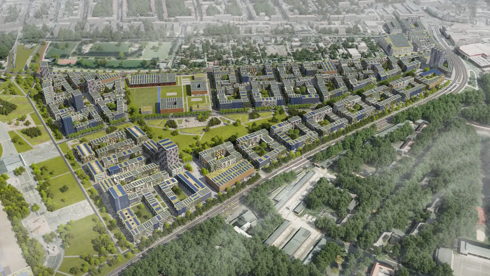 Luftbild-Visualisierung des geplanten Schumacher-Quartiers mit begrünten Wohnblocks und Sportflächen